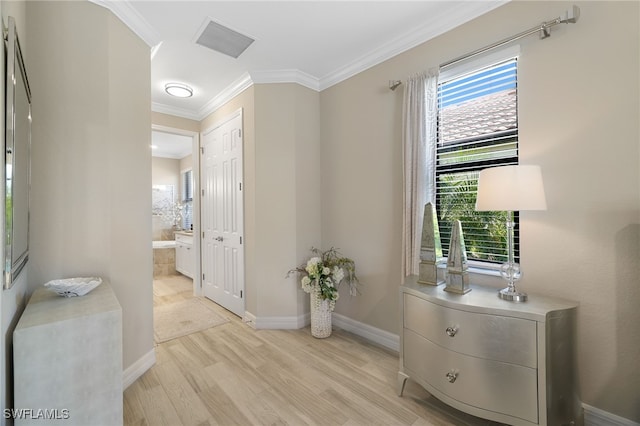 28091 Foxrock Ct, Bonita Springs, FL 34135 - interior space with light wood-style flooring, crown molding, baseboards, and visible vents