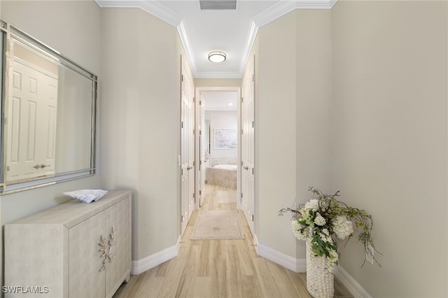 28091 Foxrock Ct, Bonita Springs, FL 34135 - hallway with ornamental molding, light wood-style flooring, visible vents, and baseboards