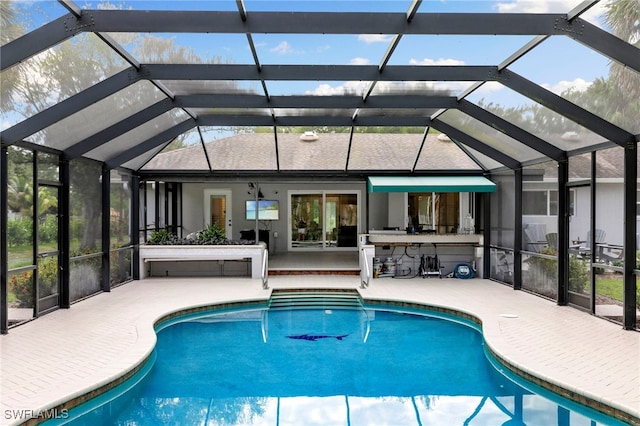1020 19th St SW, Naples, FL 34117 - outdoor pool with a patio and glass enclosure