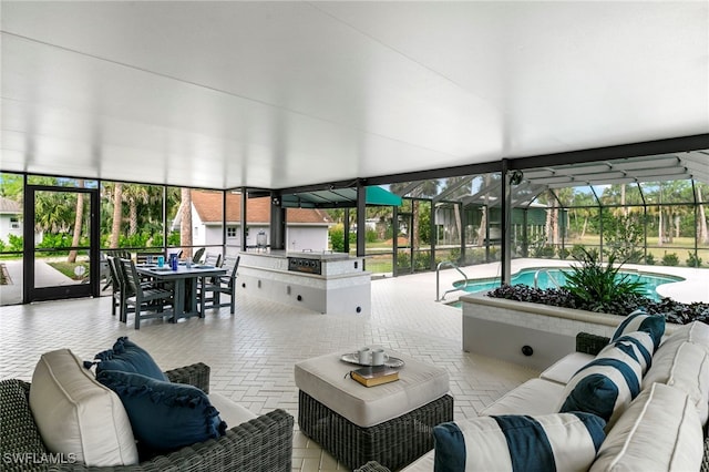 1020 19th St SW, Naples, FL 34117 - building lobby with a sunroom and a wall of windows