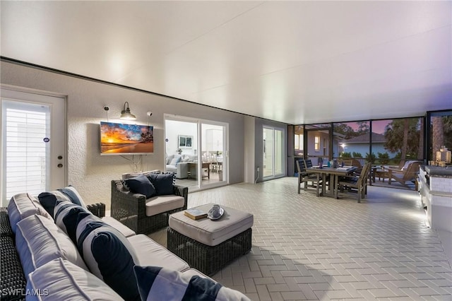 1020 19th St SW, Naples, FL 34117 - living area featuring brick flooring