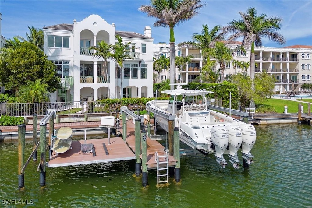 1752 Gulf Shore Blvd N Unit 4, Naples, FL 34102 - view of dock featuring a water view and boat lift