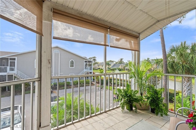 4160 Gunnison Ct Unit 821, Estero, FL 33928 - unfurnished sunroom featuring a residential view