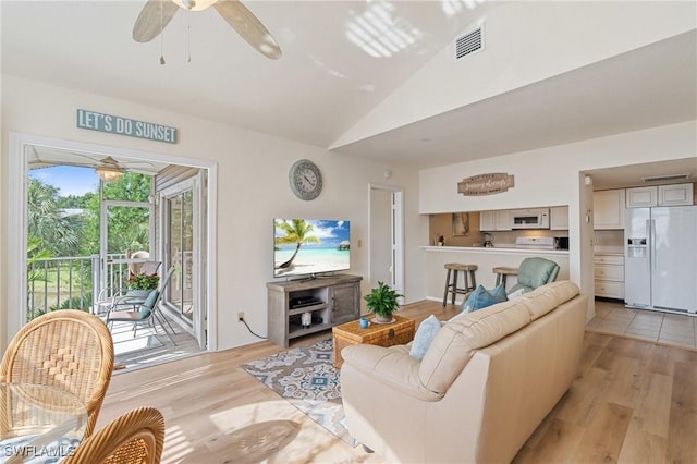 4160 Gunnison Ct Unit 821, Estero, FL 33928 - living room featuring visible vents, a ceiling fan, light wood-style floors, and lofted ceiling