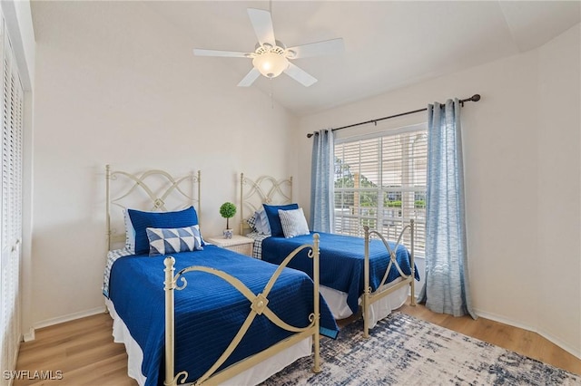 4160 Gunnison Ct Unit 821, Estero, FL 33928 - bedroom featuring ceiling fan, baseboards, wood finished floors, and lofted ceiling