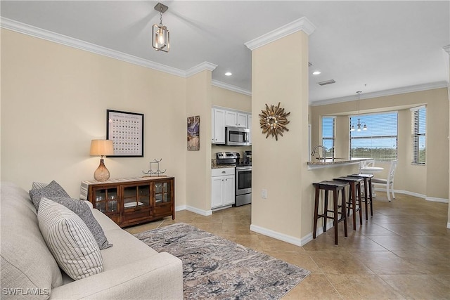 9815 Giaveno Ct Unit 1245, Naples, FL 34113 - living room featuring crown molding, baseboards, a chandelier, light tile patterned flooring, and recessed lighting