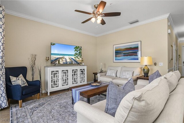 9815 Giaveno Ct Unit 1245, Naples, FL 34113 - living area featuring a ceiling fan, crown molding, tile patterned floors, and baseboards
