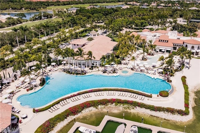 birds eye view of property with a water view