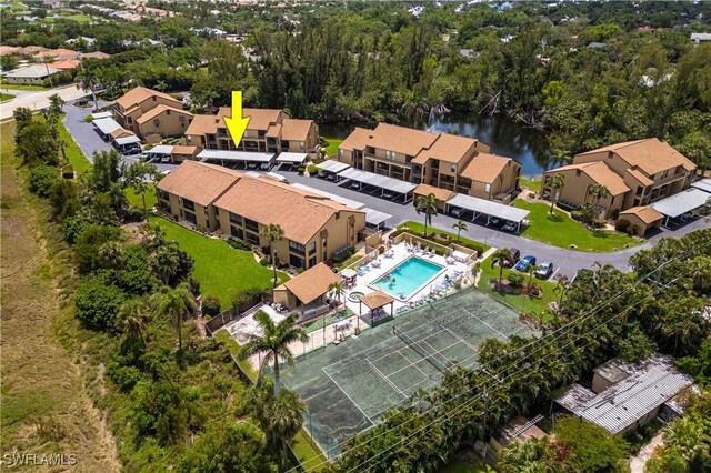 15761 Windward Way Cir Unit 3102, Fort Myers, FL 33908 - drone / aerial view of a pool area and a large body of water