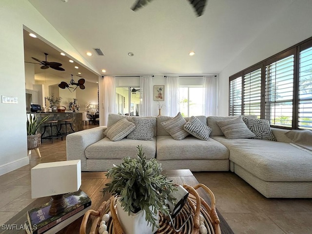 940 SE 20th Ct, Cape Coral, FL 33990 - living area featuring vaulted ceiling, baseboards, visible vents, ceiling fan, and recessed lighting