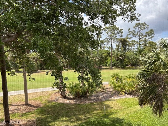 8125 Celeste Dr Unit 5213, Naples, FL 34113 - view of community with a lawn