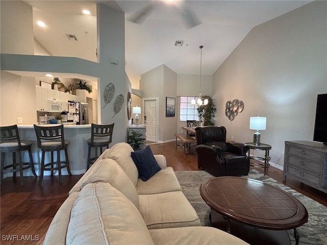 8125 Celeste Dr Unit 5213, Naples, FL 34113 - living area featuring dark wood-style floors, a notable chandelier, visible vents, and baseboards