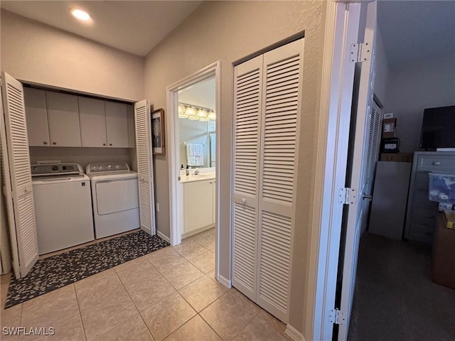 8125 Celeste Dr Unit 5213, Naples, FL 34113 - clothes washing area featuring washing machine and clothes dryer, recessed lighting, cabinet space, and light tile patterned floors
