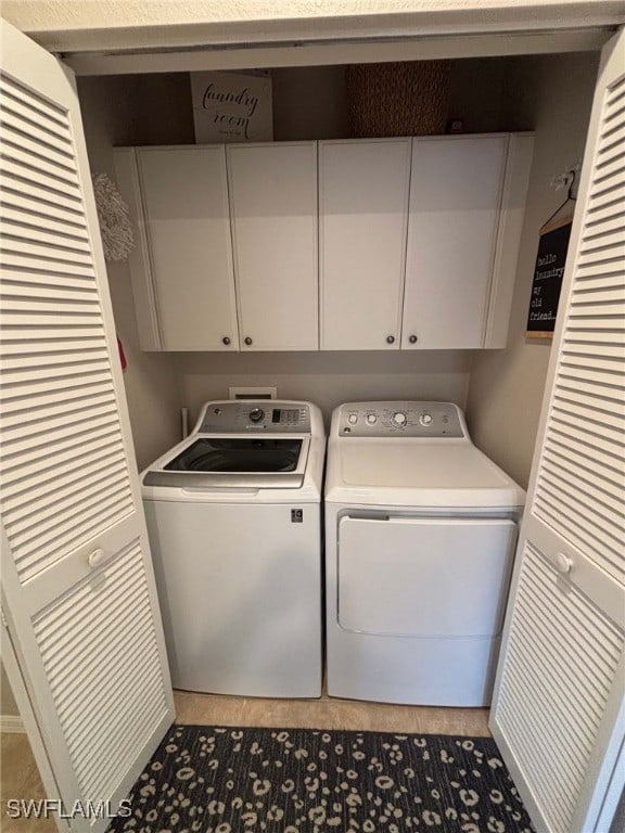 8125 Celeste Dr Unit 5213, Naples, FL 34113 - laundry area with separate washer and dryer and cabinet space