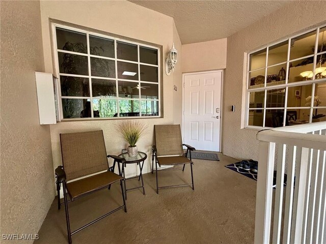 8125 Celeste Dr Unit 5213, Naples, FL 34113 - property entrance with stucco siding and a porch