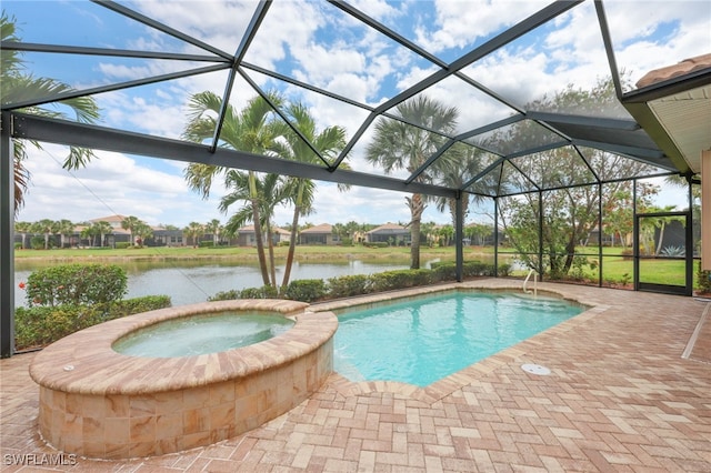 11619 Giulia Dr, Fort Myers, FL 33913 - view of pool with a patio, a water view, a pool with connected hot tub, and a lanai