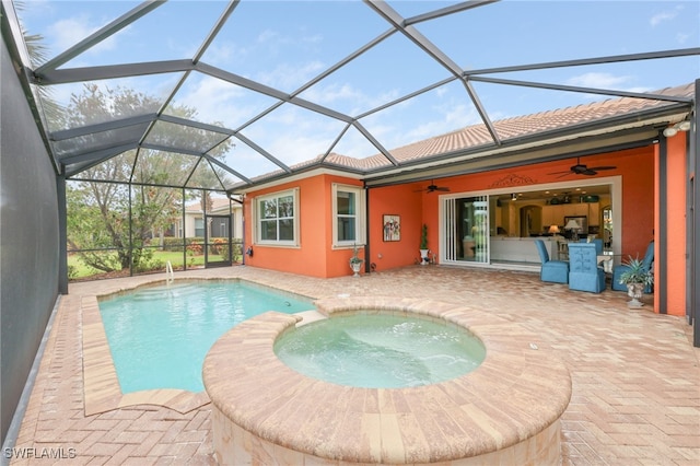 11619 Giulia Dr, Fort Myers, FL 33913 - view of pool featuring a patio, ceiling fan, a pool with connected hot tub, and a lanai