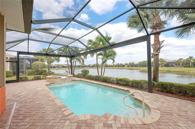 11619 Giulia Dr, Fort Myers, FL 33913 - view of swimming pool featuring a patio, a water view, a pool with connected hot tub, and a lanai