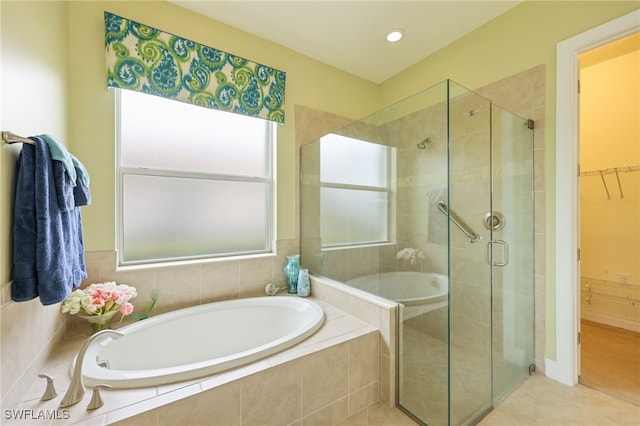 11619 Giulia Dr, Fort Myers, FL 33913 - full bath with a bath, tile patterned flooring, a stall shower, and a walk in closet