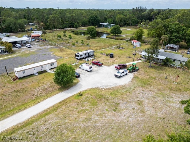 17841 Palm Creek Dr, North Fort Myers, FL 33917 - drone / aerial view featuring a view of trees