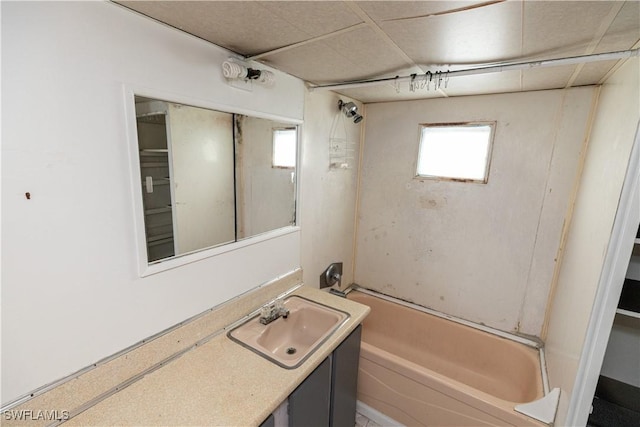 17841 Palm Creek Dr, North Fort Myers, FL 33917 - bathroom featuring washtub / shower combination, vanity, and a healthy amount of sunlight