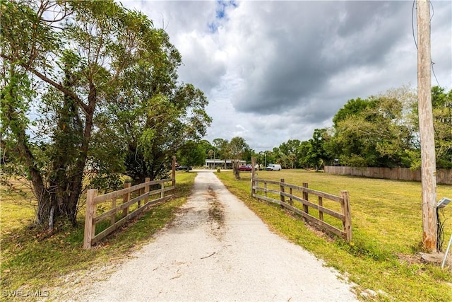 17841 Palm Creek Dr, North Fort Myers, FL 33917 - view of road with dirt driveway