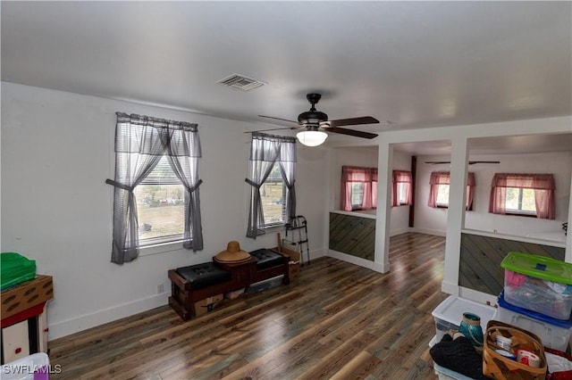 17841 Palm Creek Dr, North Fort Myers, FL 33917 - interior space with dark wood-style floors, baseboards, a ceiling fan, and visible vents
