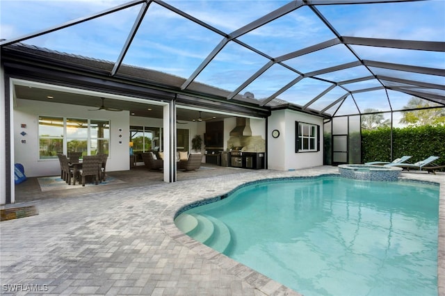 11607 Periwinkle Dr, Naples, FL 34120 - view of pool with a patio, an outdoor kitchen, a ceiling fan, and glass enclosure