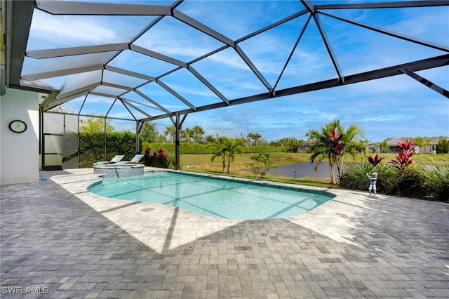 11607 Periwinkle Dr, Naples, FL 34120 - view of swimming pool featuring a patio area, a pool with connected hot tub, and glass enclosure