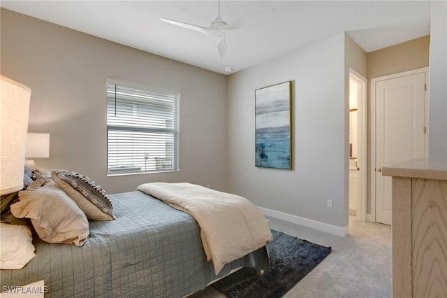 11607 Periwinkle Dr, Naples, FL 34120 - bedroom with light colored carpet, baseboards, and ceiling fan