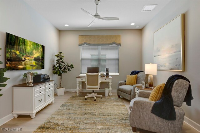 11607 Periwinkle Dr, Naples, FL 34120 - office area with light wood-style floors, visible vents, baseboards, and ceiling fan