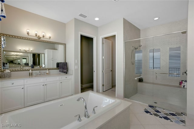 11607 Periwinkle Dr, Naples, FL 34120 - bathroom featuring vanity, visible vents, tile patterned floors, a stall shower, and a bath