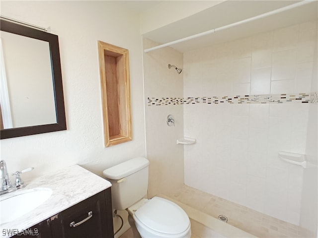 316 SE Santa Barbara Pl, Cape Coral, FL 33990 - bathroom featuring vanity, toilet, and tiled shower