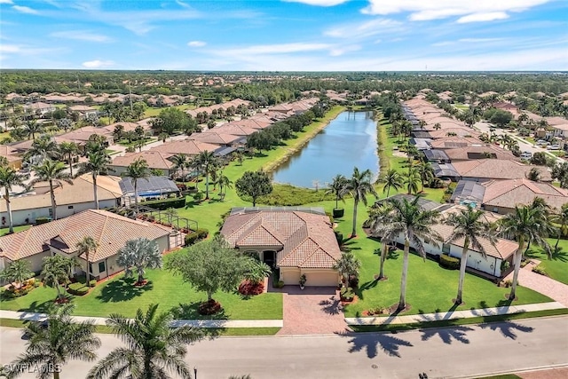 aerial view with a water view and a residential view