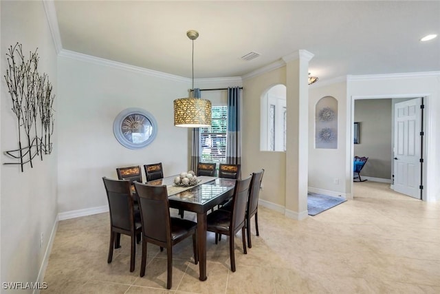 dining space featuring light tile patterned flooring, baseboards, ornamental molding, and visible vents