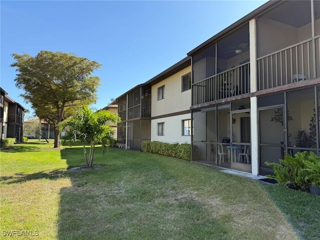 view of community featuring a lawn
