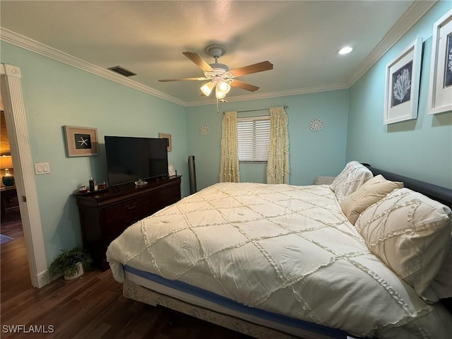 bedroom featuring crown molding, dark wood-style flooring, ceiling fan, and visible vents