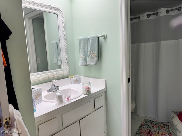 full bath with toilet, tile patterned floors, vanity, and a shower with curtain