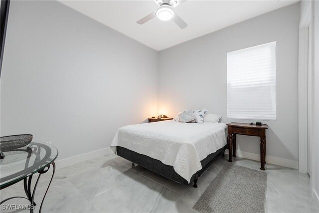 302 NW 1st St, Cape Coral, FL 33993 - bedroom featuring vaulted ceiling, baseboards, and ceiling fan