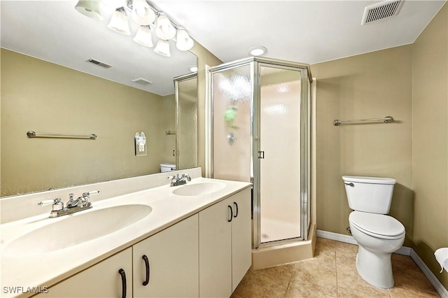 bathroom featuring a sink, toilet, and visible vents