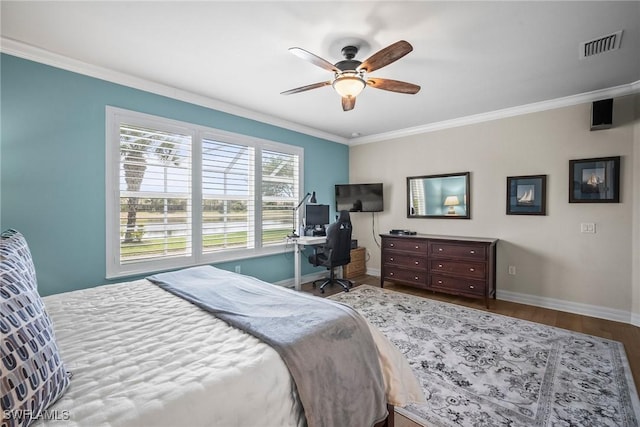 8629 Julia Ln, Naples, FL 34114 - bedroom with crown molding, visible vents, baseboards, and wood finished floors