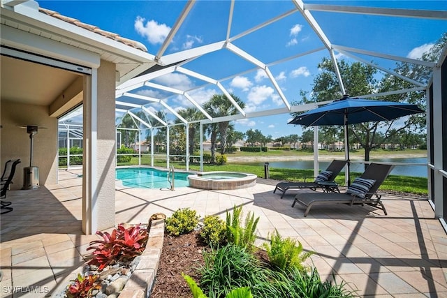 8629 Julia Ln, Naples, FL 34114 - view of pool featuring a water view, a pool with connected hot tub, a patio, and a lanai