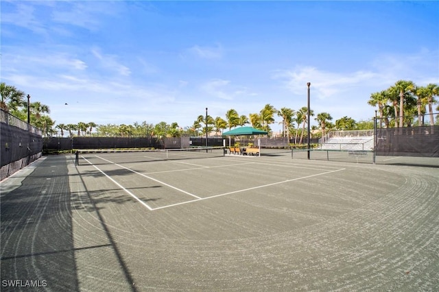 8629 Julia Ln, Naples, FL 34114 - view of tennis court with fence and community basketball court