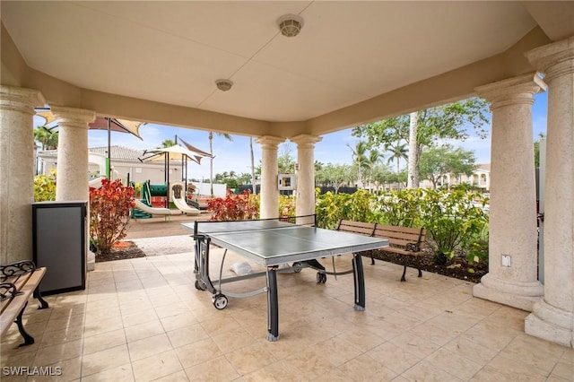 8629 Julia Ln, Naples, FL 34114 - view of patio / terrace featuring a playground