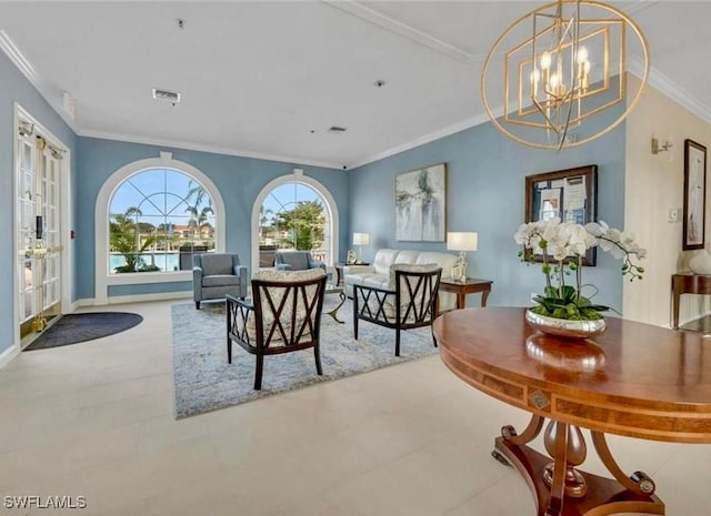 tiled living room with visible vents, ornamental molding, baseboards, a chandelier, and french doors