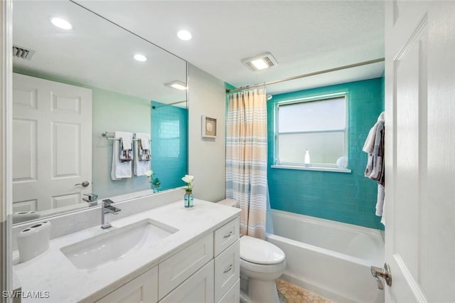 bathroom with vanity, toilet, shower / bath combination with curtain, recessed lighting, and visible vents