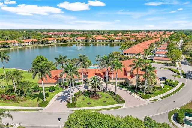 aerial view featuring a water view and a residential view