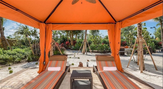 view of patio with a gazebo and outdoor dining space