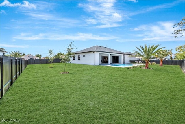 1041 Embers Pkwy W, Cape Coral, FL 33993 - view of yard with a fenced backyard and a patio area