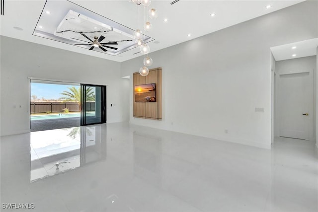 1041 Embers Pkwy W, Cape Coral, FL 33993 - unfurnished room with a notable chandelier and recessed lighting